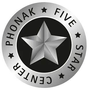 A circular emblem with a silver border and a black background, featuring a 3D silver star in the center. Around the star are the words PHONAK FIVE STAR CENTRE with small star icons separating the words.
